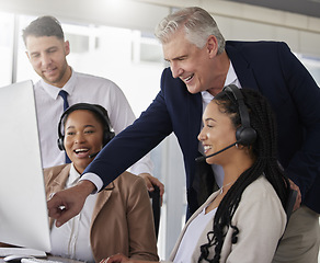 Image showing Training, happy team or manager in call center coaching telemarketing in customer services in office. Leadership, crm contact us or mentor teaching an insurance agent on new job tasks on a computer