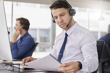 Image showing Call center, business man and corporate paperwork of a telemarketing employee with a document. Reading, online consultation and web support worker with consulting script and conversation point list