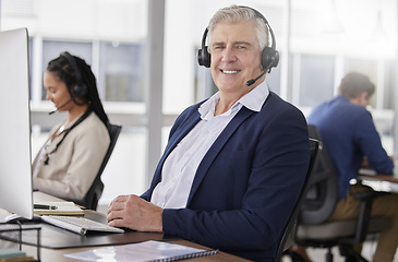 Image showing Call center portrait, happy or friendly man in communication, speaking or talking to help with customer services. Smile, crm or mature sales agent with microphone in crm technical support office
