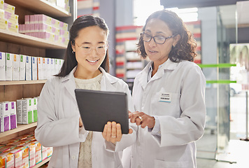 Image showing Pharmacist, tablet and teamwork of women in pharmacy for healthcare, stock take or online consultation. Telehealth, collaboration or happy medical professionals in discussion of touchscreen research.