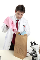 Image showing Forensic scientist with evidence