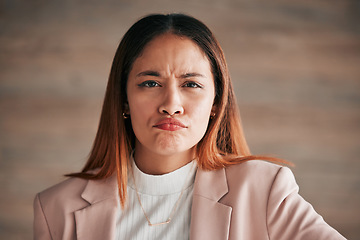 Image showing Portrait, frown and business woman in office confused, unsure or unhappy on wall background. Face, sad and angry corporate employee, doubt and emoji expression, overwhelmed and wondering at new job