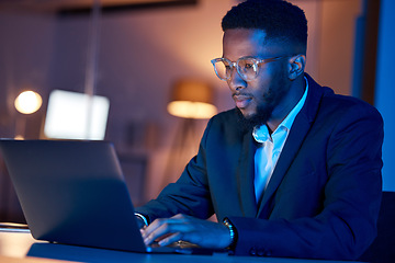 Image showing Black man, laptop and typing, businessman focus with coding or writing report, information technology and data analysis. Email, networking and research, programmer and software upgrade at night