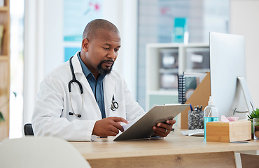 Image showing Healthcare, black man and doctor with clipboard, report and information for procedure, schedule and details. African American male employee, surgeon or medical professional with documents or feedback