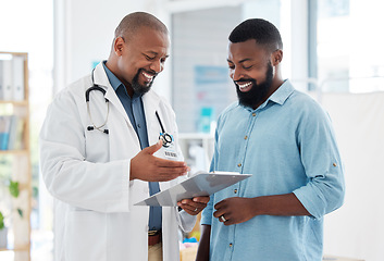 Image showing Healthcare, black man and doctor with clipboard, diagnosis and conversation for results, smile and care. Male patient, guy and medical professional with documents, paperwork for insurance and talking