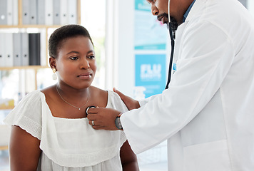 Image showing Healthcare, doctor listen to patient heartbeat and stethoscope, black people in hospital with medical consultation. Cardiology, heart and health insurance, woman and man at clinic with examination