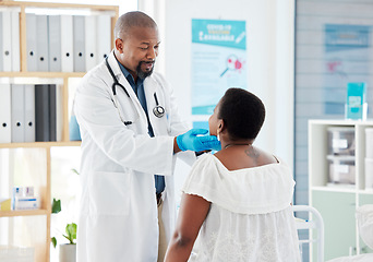 Image showing Black man, senior doctor and patient with sore throat, medical examination, consultation in hospital and healthcare. Communication, woman and man check tonsils with medicine professional and health