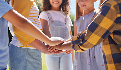 Image showing Hands together, support and children outdoor, solidarity and trust with motivation, games or growth. Closeup, kids or youth group with gesture for teamwork, commitment or fun with development or goal