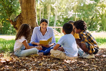 Image showing Teacher reading, tree or children with book for learning development, storytelling or growth in park. Smile, youth or happy educator with stories for education at a kids kindergarten school in nature