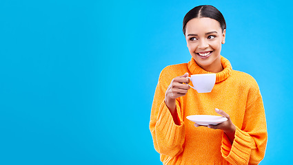 Image showing Tea, woman and smile in studio with mockup and happiness with mug. Isolated, blue background and happy female model and young person relax with casual winter fashion and joy from hot drink smiling