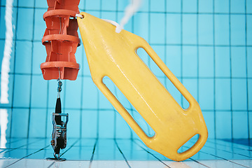 Image showing Above, water and a buoy in a pool for a lifeguard, life saving and safety. Board, summer and equipment for protection, security and danger while swimming, rescuing and protecting from drowning