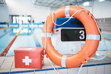 Image showing Swimming, equipment and first aid at a pool for security, safety and emergency. Healthcare, guarding and kit for protection, help and support for water activities, sports competition or recreation