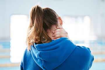 Image showing Hands, neck pain and injury at swimming pool after exercise, training or workout accident. Sports, swim athlete and woman with ache, fibromyalgia or tendinitis after exercising or practice.