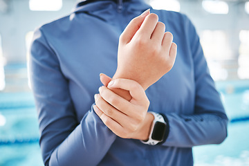 Image showing Hands, wrist pain or girl swimmer with injury after exercise, training or workout accident in practice. Closeup, sports athlete or woman with fibromyalgia, tendinitis or broken bone inflammation