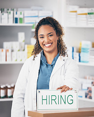 Image showing Pharmacy woman, smile and poster in portrait for hiring, job and opportunity in healthcare store. Pharmacist, small business owner and paper for recruitment, onboarding and announcement for medicine