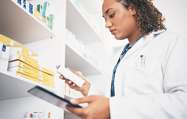 Image showing Tablet, stock and medicine with a pharmacist woman at work to fill an online order or prescription. Medical, product and insurance with a female working as a professional in healthcare at a pharmacy