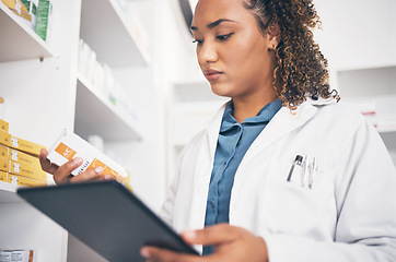 Image showing Tablet, stock and healthcare with a pharmacist woman at work to fill an online order or prescription. Medical, product and insurance with a female working as a medicine professional in a pharmacy