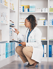 Image showing Tablet, stock and insurance with a pharmacist woman at work to fill an online order or prescription. Medical, product and healthcare with a female working as a medicine professional in a pharmacy