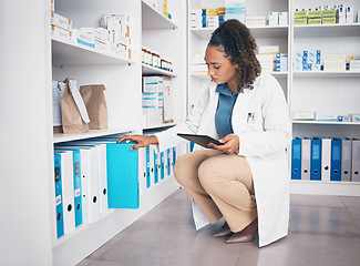 Image showing Pharmacy shelf, file and pharmacist woman on tablet for medicine management, stock administration or inventory. E commerce, logistics and research of medical doctor or pharmacist with folder check