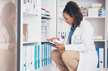 Image showing Tablet, stock and product with a woman in a pharmacy to fill an online order of prescription treatment. Medical, healthcare and insurance with a female pharmacist working as a medicine professional