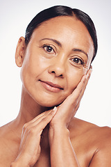 Image showing Old woman in portrait, beauty and antiaging skincare, natural cosmetics and face isolated on studio background. Female, facial and cosmetic care for aging skin, dermatology and hygiene with glow