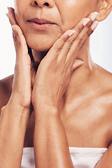 Image showing Hands, mouth and beauty with a mature woman in studio for skincare, anti aging treatment or cosmetics. Skin, facial and wellness with a senior female touching her face for hydration closeup