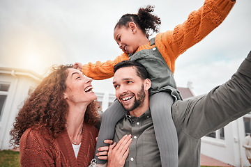 Image showing Happy family, piggy back and parents with child in yard of new house, happiness and security at home. Interracial mother, father and girl bonding in backyard together with love and smile on weekend.