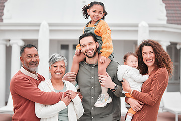 Image showing Portrait, big family with smile and piggy back at new home, grandparents and parents with kids in happiness and security. Happy men, women and children in backyard together with love outside house.