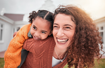 Image showing Smile, piggy back and happy woman with child in yard of new house, happiness and adoption at family home. Interracial mom and girl bonding in backyard together with love and outdoor fun on weekend.