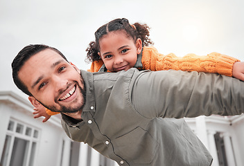 Image showing Portrait, piggy back and happy man with child in yard of new house, happiness and security at family home. Homeowner, father and girl bonding in backyard together with love and outdoor fun on weekend