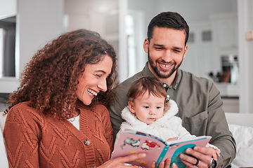 Image showing Parents, baby and reading story on sofa with smile, happiness and bonding with love in living room. Man, woman and child with book for learning, care and relax together on lounge couch in family home