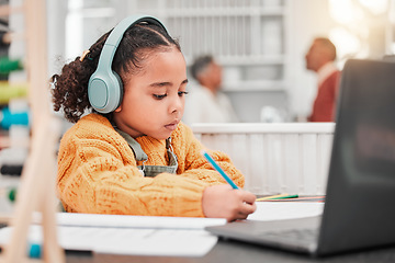 Image showing Headphones, elearning and kid writing in home for online class, homeschool and homework. Laptop, education and development of girl studying, distance learning and knowledge, notes and growth in house