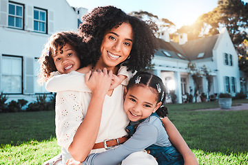 Image showing Family, garden and portrait of mother with children relax in backyard for bonding, quality time and playing outdoors. Love, new house and mom with girls smile on summer vacation, weekend and hugging