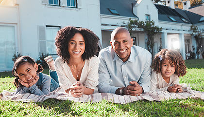 Image showing Family, children and portrait outdoor with parents on lawn in backyard for love and care. Happy kids, man and woman together for support, peace or quality time with a smile for security on blanket