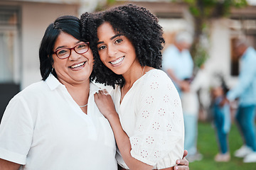 Image showing Portrait, family and mother with adult daughter, hug and happiness for wellness, affection and bonding outdoor. Face, happy woman and mama embrace, cheerful and smile in backyard, support or together