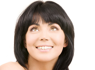 Image showing happy woman looking up