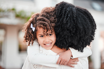 Image showing Portrait of girl hugging mother for love, affection and bonding in garden for relaxing, quality time and care outdoors. Family, smile and mom in child embrace on summer vacation, weekend and holiday