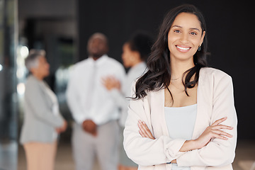 Image showing Business woman, portrait smile and leadership for meeting, planning or teamwork collaboration at the office. Happy and confident female leader or manager smiling with arms crossed for team management