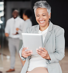 Image showing Business, smile and mature woman with tablet, connection and online reading for information. Female entrepreneur, manager or employee with device, technology and management with leadership skills