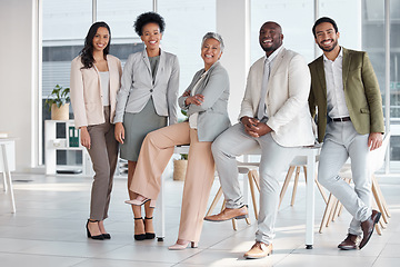 Image showing Team, diversity and portrait of business people in the office posing together after a meeting. Collaboration, staff and multiracial group of colleagues or friends standing in the modern workplace.