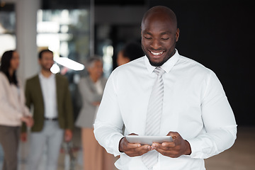 Image showing Digital tablet, happy and black man with team in office for meeting, planning or coworking schedule. Cheerful, smile and male leadership online with group of business people for startup mission or