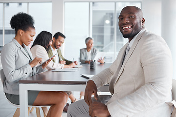 Image showing Businessman, portrait smile and leadership in meeting, planning or teamwork collaboration at the office. Happy black man leader or manager smiling in team management or idea strategy in the boardroom