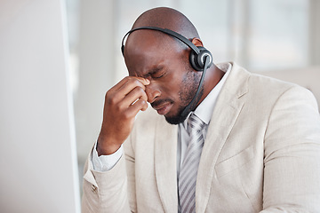 Image showing Tired call center man with headache, fatigue and pain on computer customer support, telecom working or virtual help desk. Burnout agent, stress consultant or african person with migraine at office