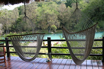 Image showing Terrace of luxury jungle resort by river