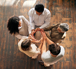 Image showing Teamwork, circle and synergy of people hands for collaboration, workflow and group or team building above. Integration, formation and support, cooperation or community of women and men with agreement