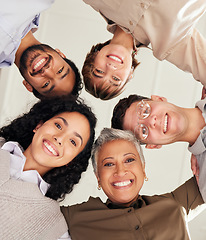 Image showing Faces, portrait or happy business people in huddle with goals, support or motivation for success. Low angle of mission, team work or employees planning our vision, sales target or strategy in meeting