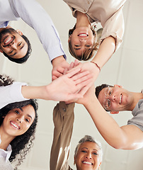 Image showing Hands stacked, teamwork and people portrait in support, collaboration or team building mission from below. Group, circle or business women and men, together hand sign and happy goals with diversity