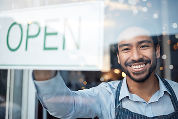 Image showing Asian man, small business and portrait smile with open sign on window for service in coffee shop or restaurant. Male entrepreneur or manager with billboard or poster for opening retail store or cafe