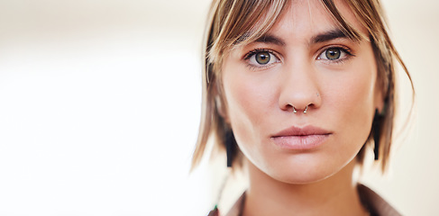 Image showing Beauty, serious and portrait of a woman in a studio with a positive and confidence mindset. Beautiful, young and headshot of female model from Mexico standing by a blurry background with mockup space