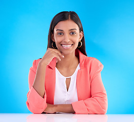 Image showing Portrait, confident and woman with smile, business and formal outfit against blue studio background. Face, female employee and executive with happiness, management and leadership skills with success